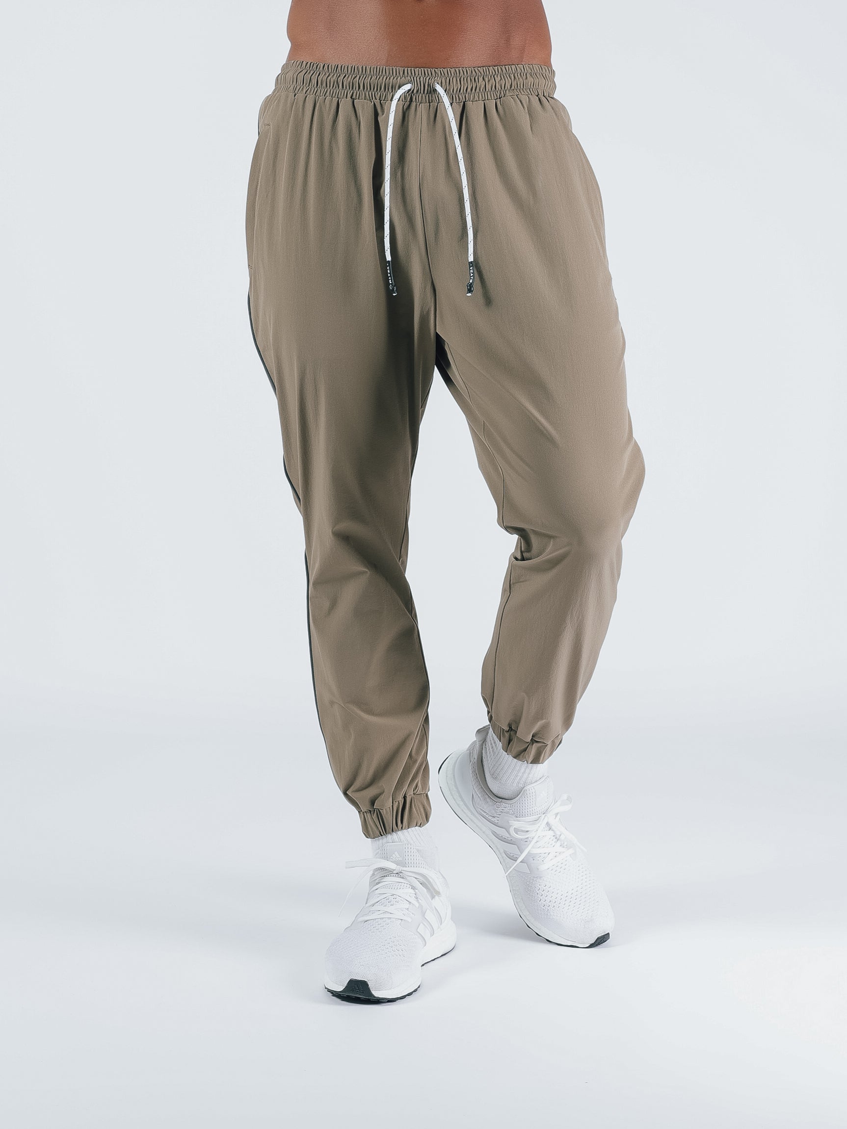 WIND STRETCH LONGPANTS【KHAKI】