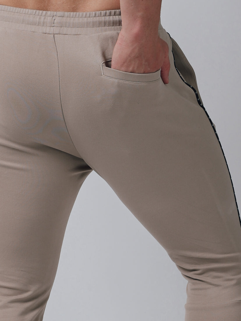 WARM UP STRETCH LONGPANTS【LIGHT BEIGE】